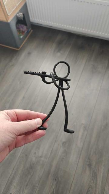 Flute playing stick man 3D model thumbnail