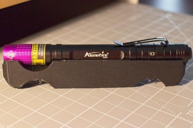 Mount for an Alonefire SV64 Mini 3W UV Flashlight. 3D model thumbnail