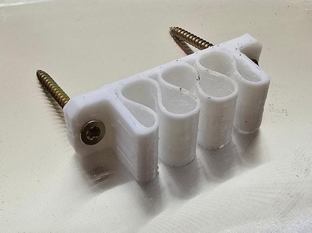 UniversalCableHolder_3_slots_3mm_holes 3D model thumbnail