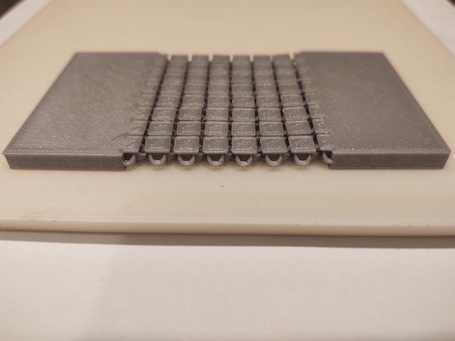 Flipped 3d printed fabric with glue-able tabs 3D model thumbnail