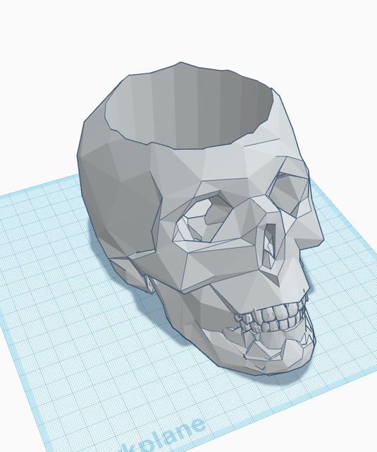 Low poly skull carved for  Halloween candies or Candle inside 3D model thumbnail