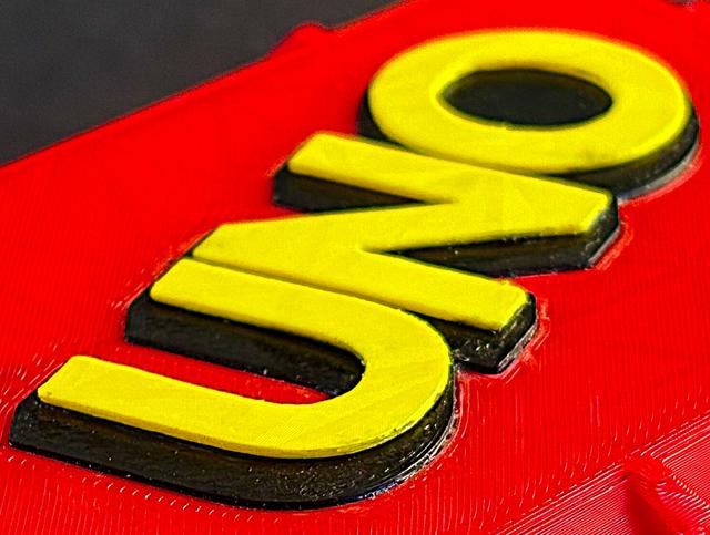 Separate UNO letters and background for gluing onto lid. 3D model thumbnail