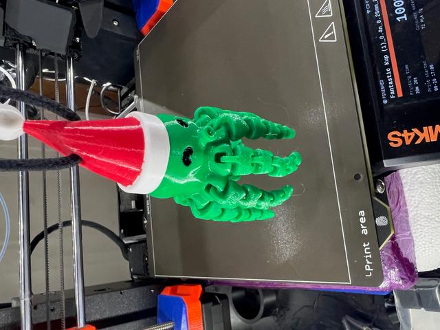 Flexi Octopus with Christmas Hat and Hole 3D model thumbnail