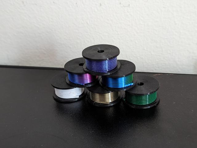 Mini Filament Spool Swatch with Holes 3D model thumbnail