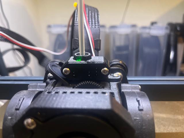Elegoo Neptune 4: Optical Filament Runout Sensor Mount for SilencedFrost SF 3x5015 Neptune 4 Fan Mod Shroud - ECAS04 fitting 3D model thumbnail