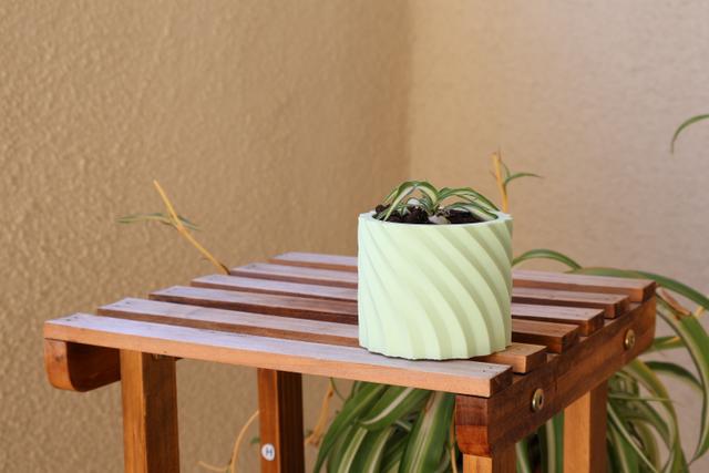 Spinning Spiral Pot with drainage holes 3D model thumbnail