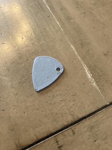 Guitar pick with keyring hole 3D model thumbnail